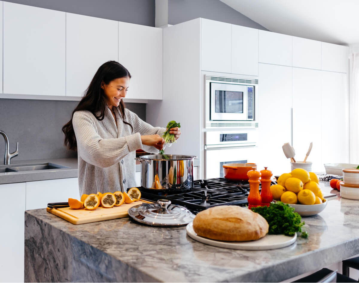 Lady cooking at the stove